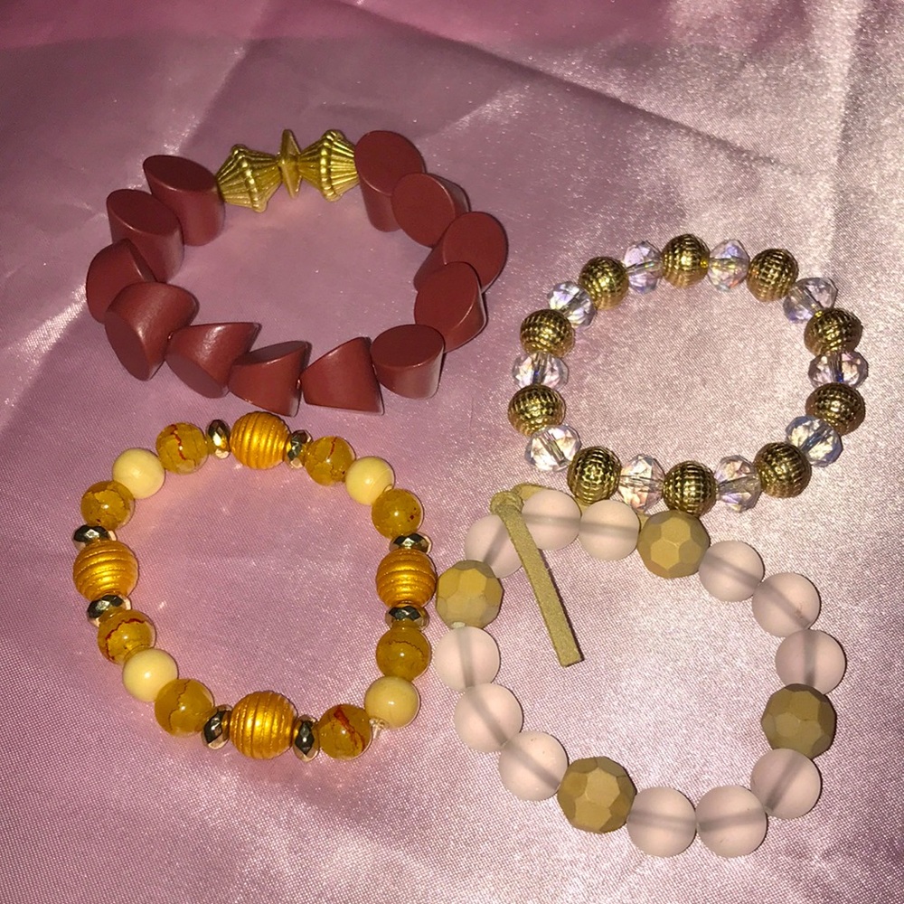 Set of 4 Plunder bracelets.